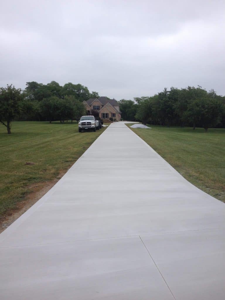 New concrete driveway in Greater Cincinnati, the long-lasting side of the asphalt vs concrete driveway choice